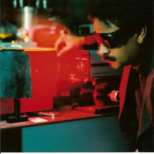 Dr. Misra aligning a red dye laser beam